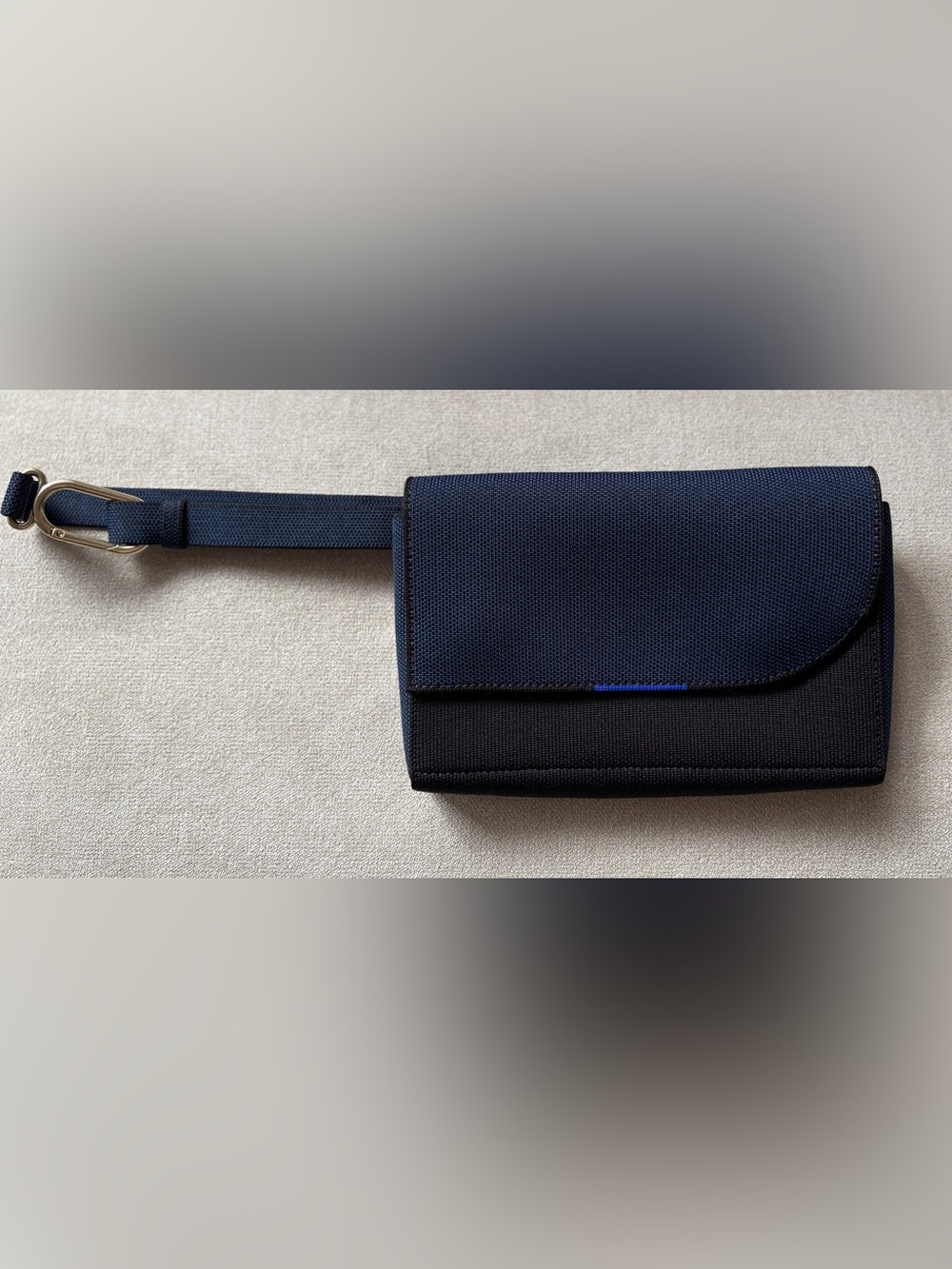 Rothy’s navy and black crossbody/beltbag